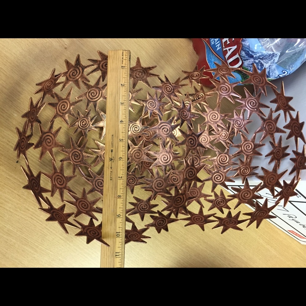 Tobin James starburst copper color bowl